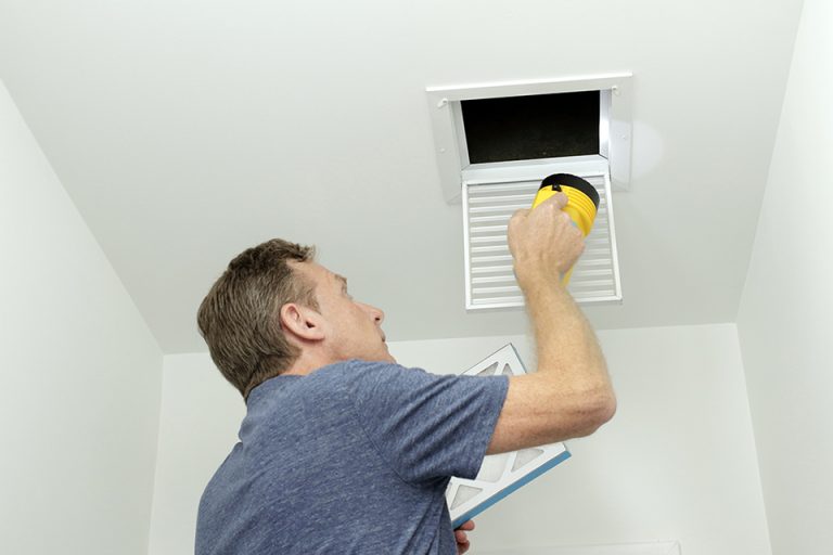 technician realizing duct cleaning