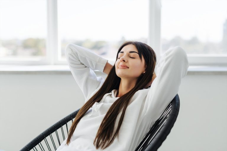 woman relaxing in her house