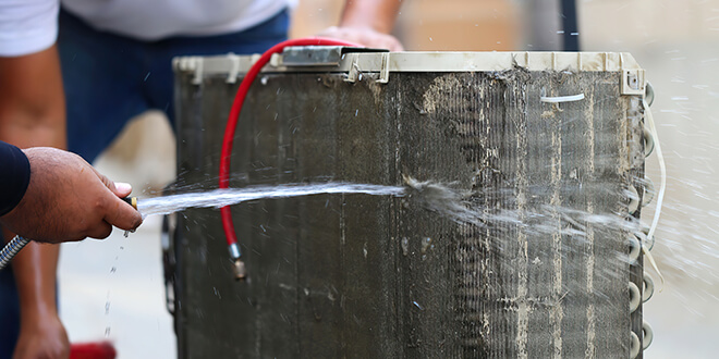 Coil Cleaning Bonney Lake, technician cleaning coil