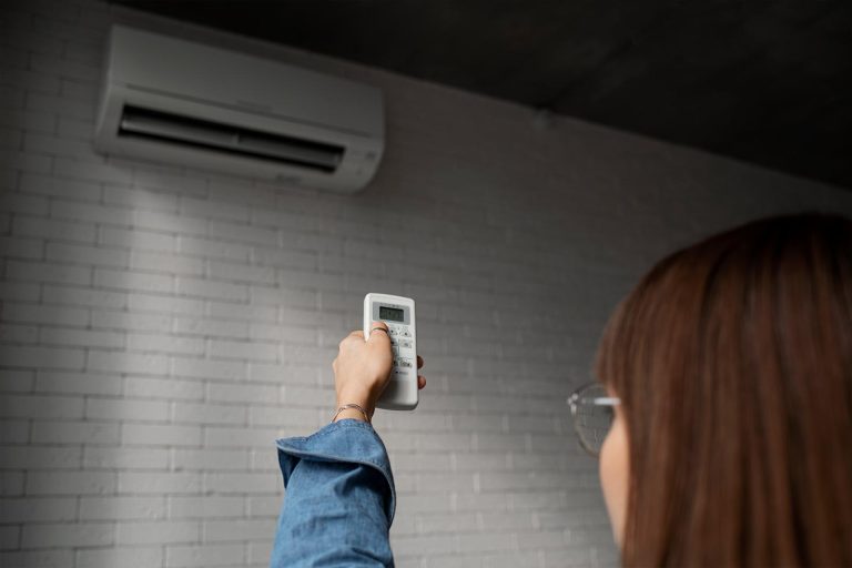 woman using her mini split unit