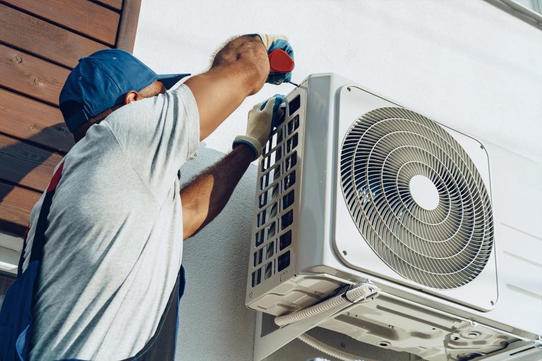ac repair in Bonney Lake WA, technician working in ac unit